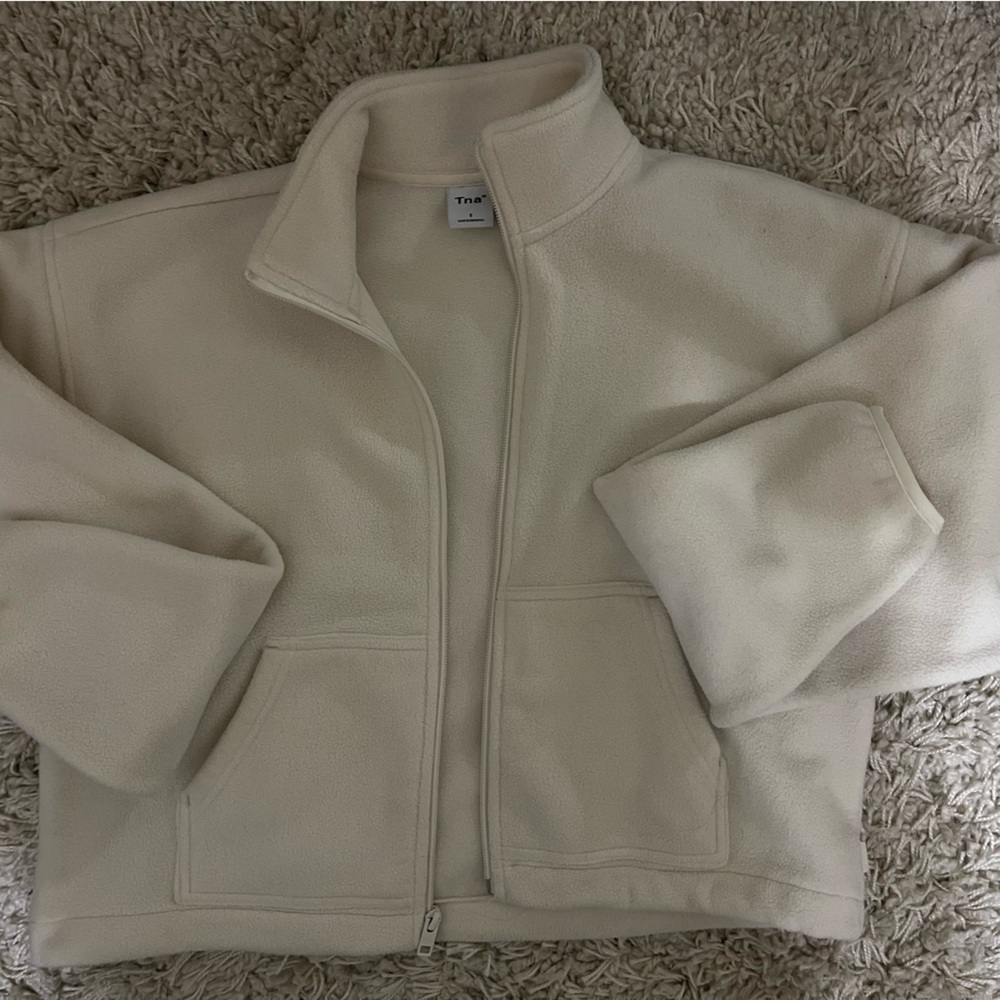 TNA polar zip up
